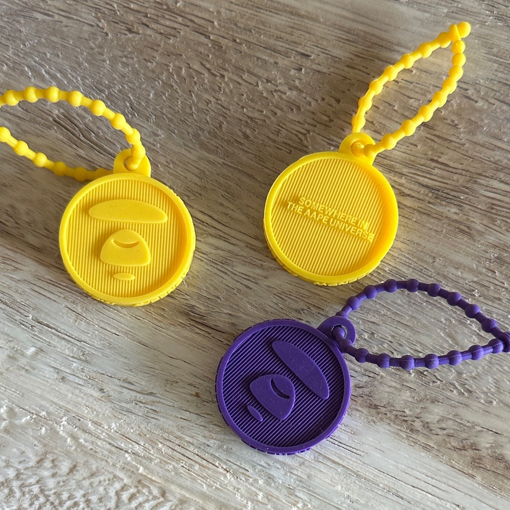 A Bathing Ape (AAPE) Yellow and Purple Keychains